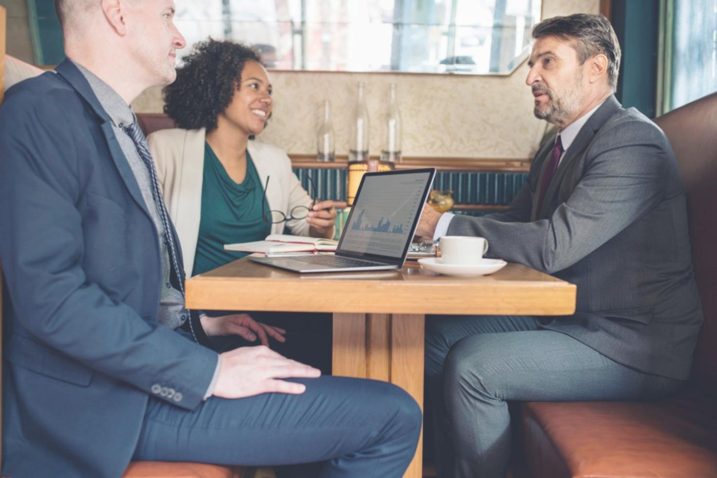 Professional consultation meeting discussing investment strategies